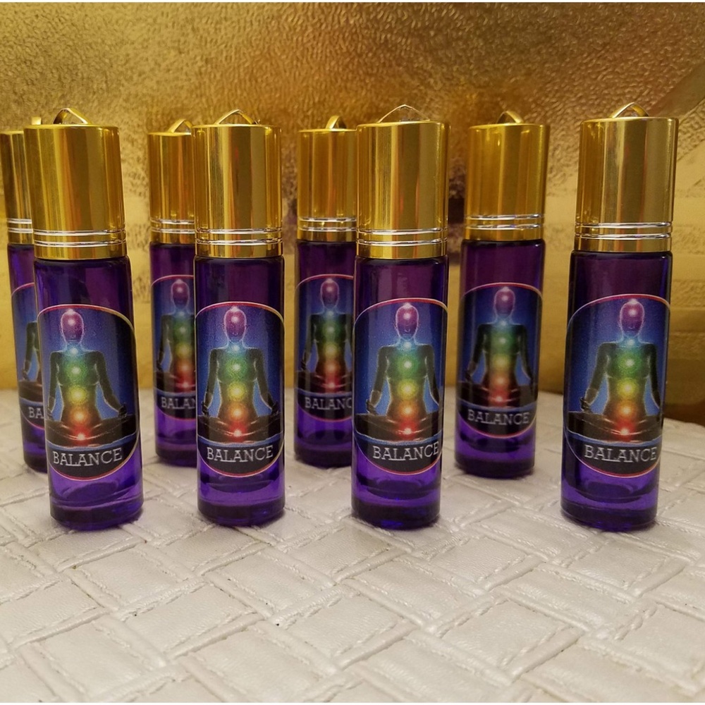 Energy balancing oil with crystals, roller bottle
